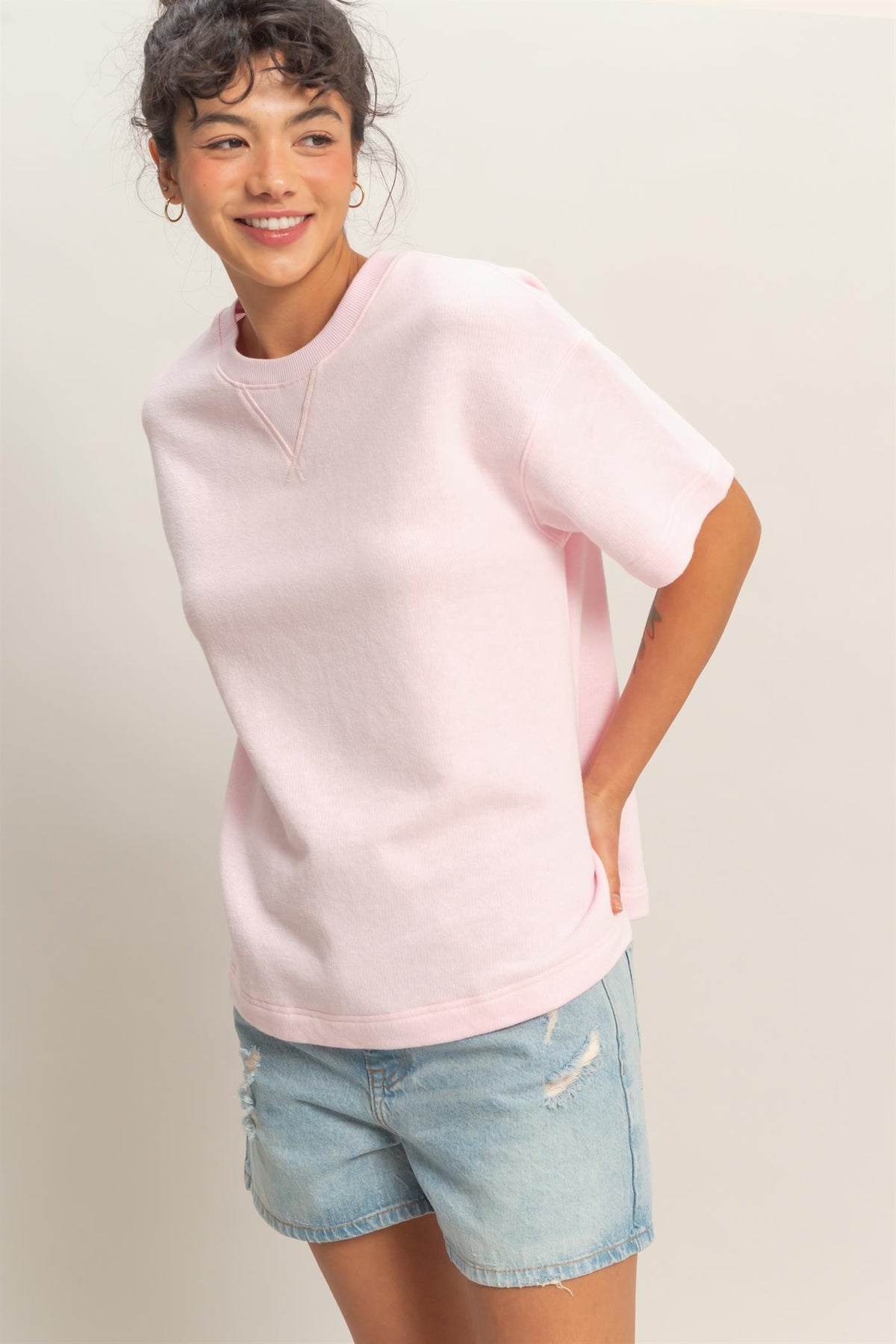 Airine crew neck short sleeve top in solid color made from cotton polyester blend with relaxed silhouette