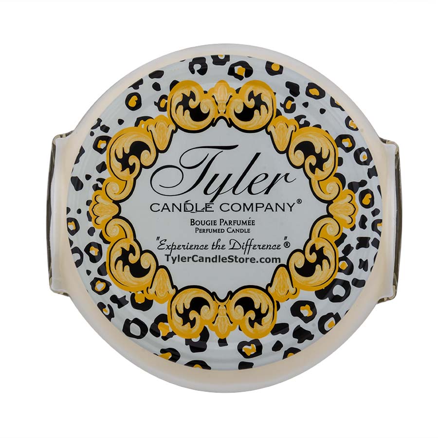 Top view of an 11oz Tyler Candle Company Regal 2 Wick Candle with a leopard print and gold label.