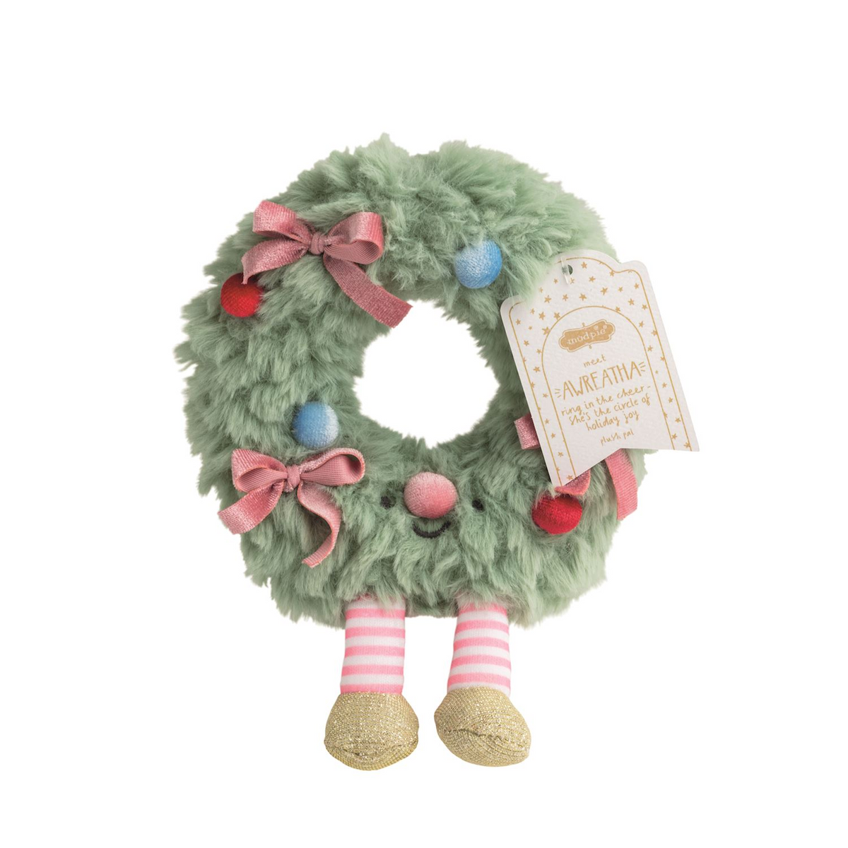 Green fuzzy wreath plush toy with pink bows, striped legs, and gold shoes.