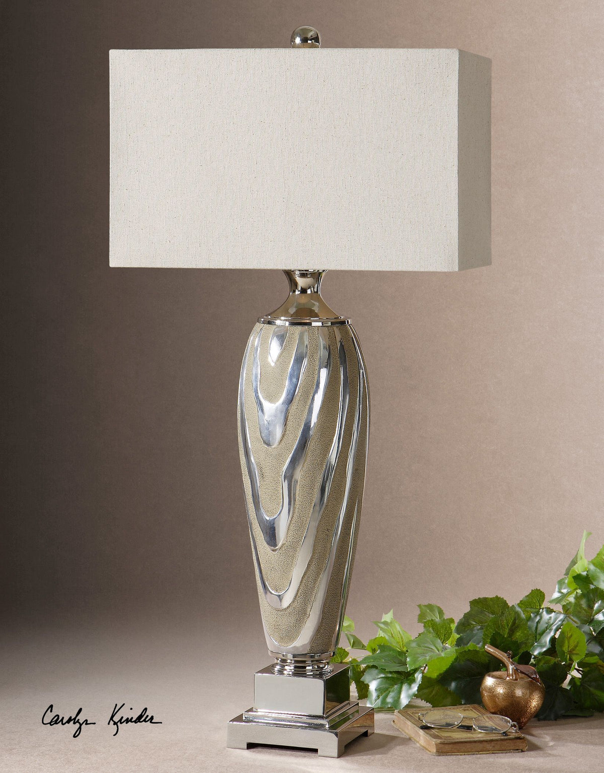 Allegheny table lamp with a textured silver and beige wavy pattern on its base, topped with a rectangular cream shade.