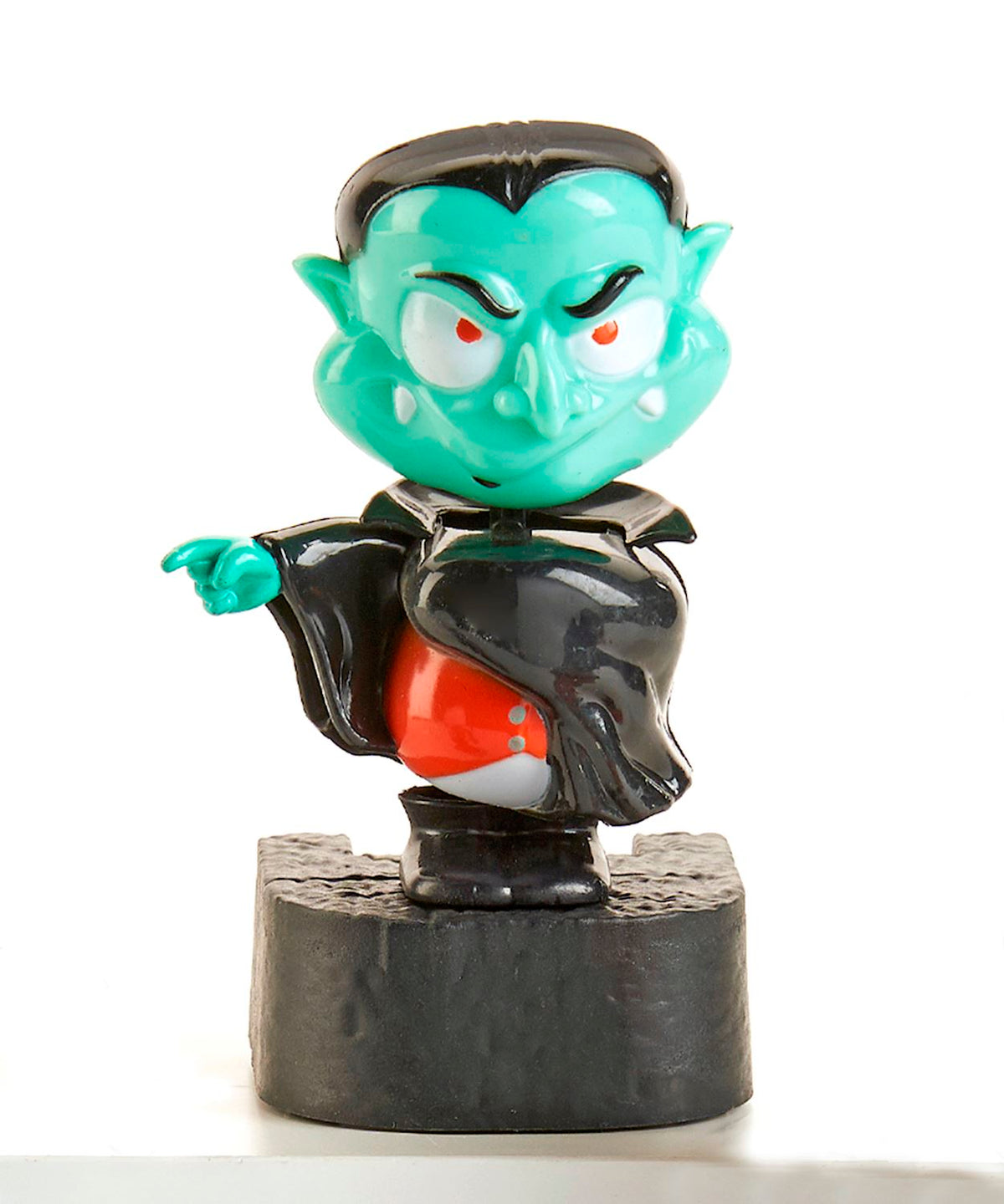 ABC Solar Dancer Vampire figurine with green skin, black cape, and red vest on a black base.