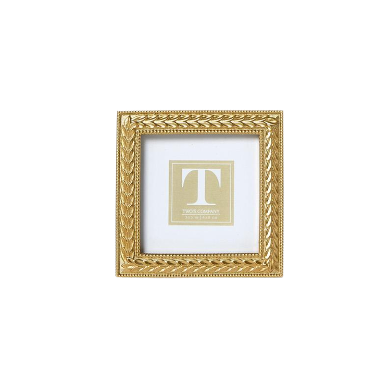 Square gold photo frame with an intricate laurel wreath design and beaded edges.