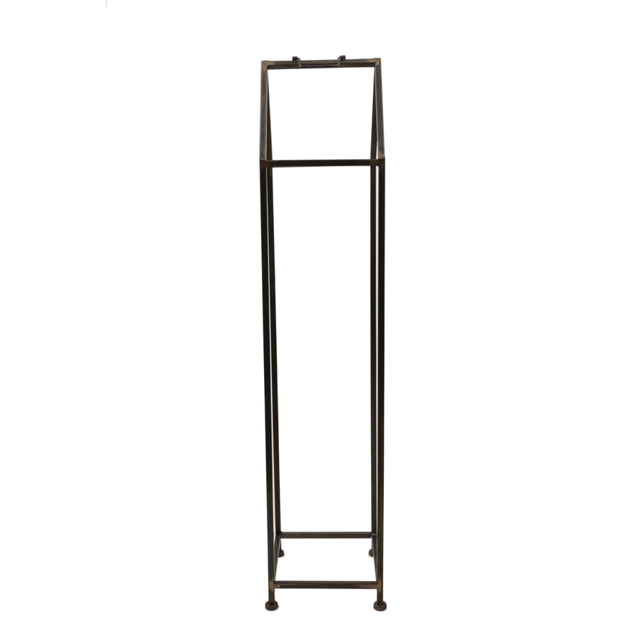 Metal house-shaped log holder with a rustic industrial finish.