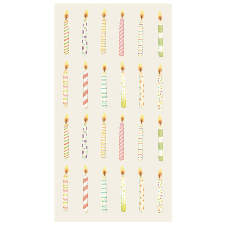 Guest napkin featuring four rows of colorful, patterned birthday candles with lit flames.