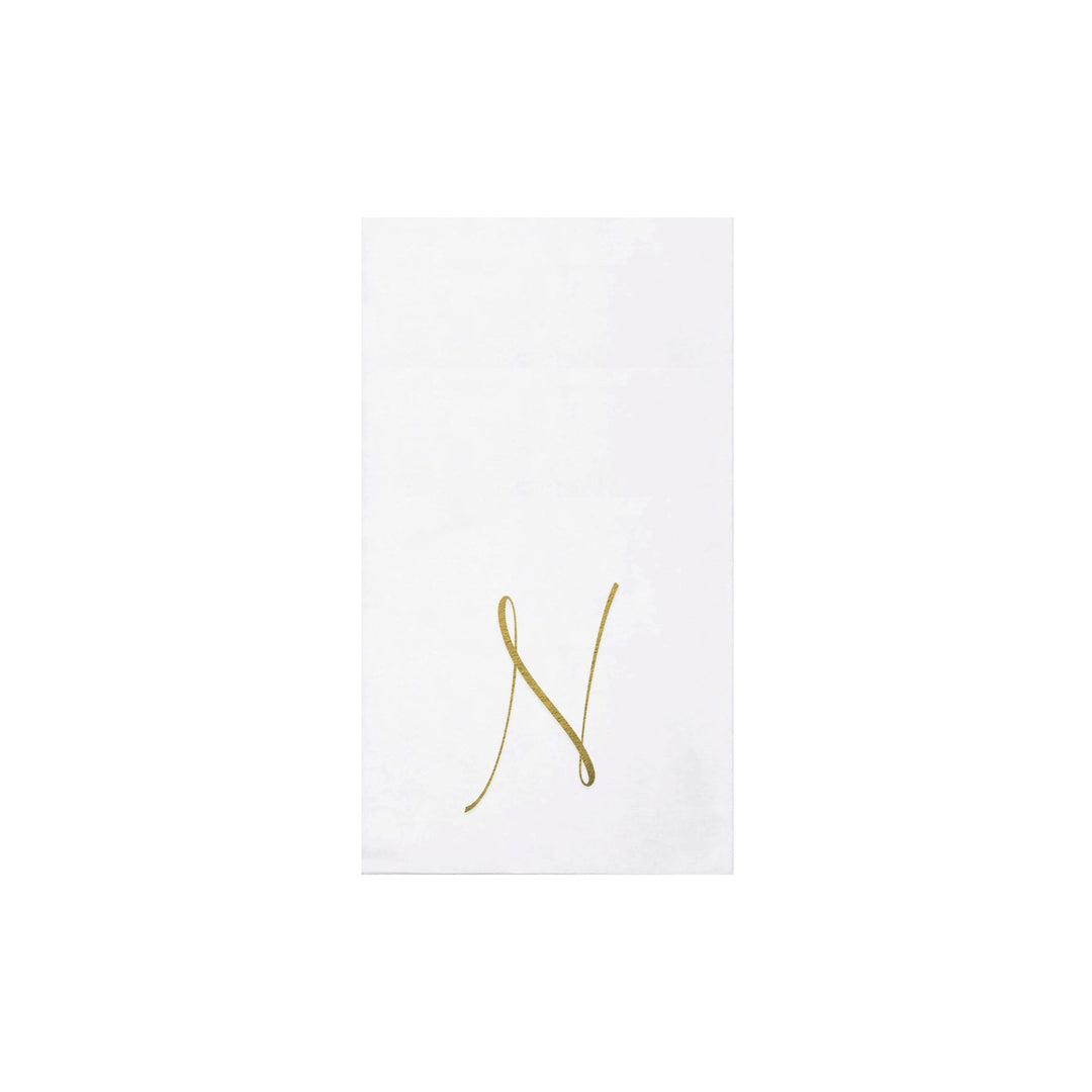 White Papersoft guest towel napkin featuring a gold script monogram letter N.