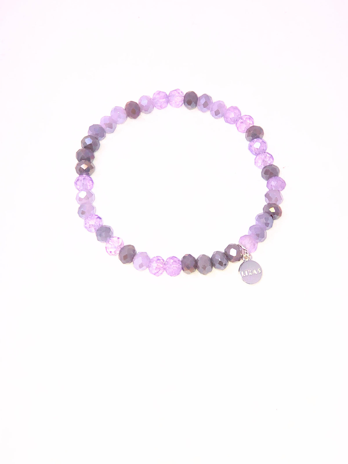 Stretchy beaded bracelet with faceted glass beads in a colorful pattern.