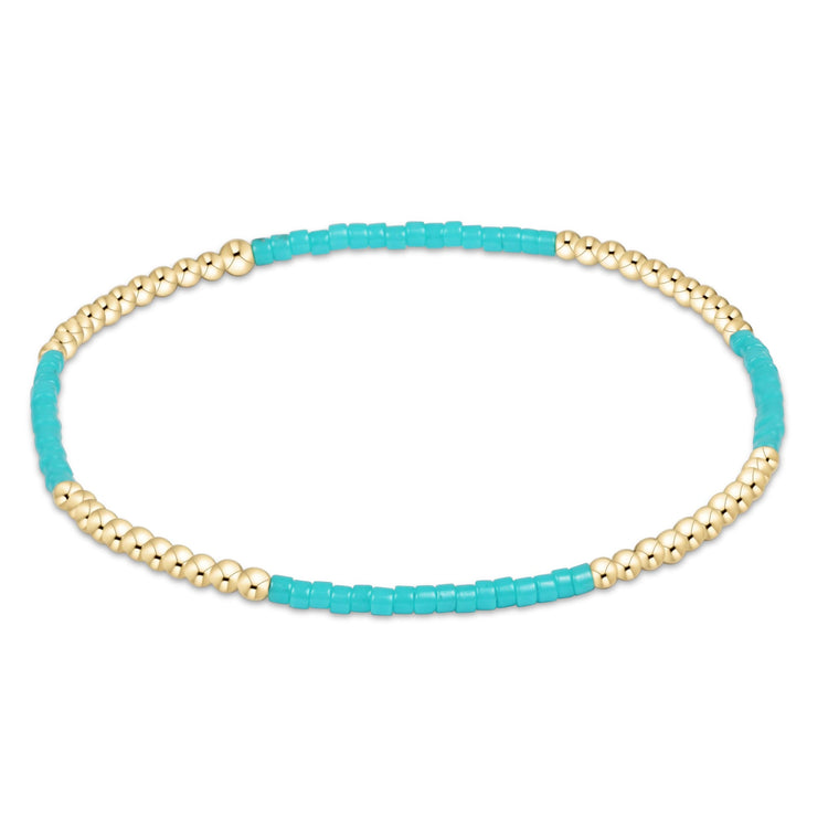 Hope Blissful bracelet featuring a gold-filled seed bead charm on high-performance elastic.