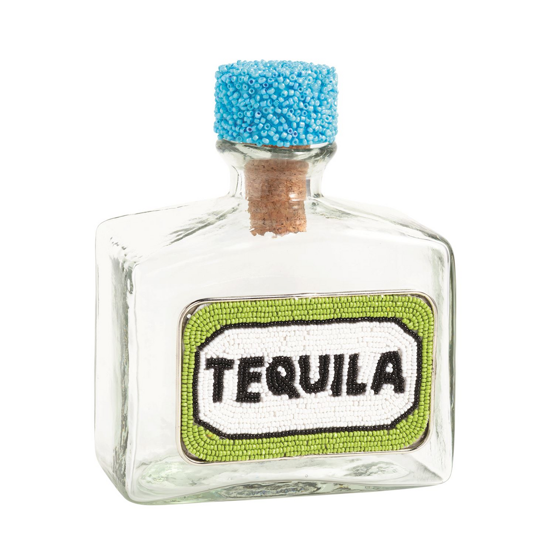 Glass tequila decanter with a green and white beaded label and a blue beaded cork stopper.