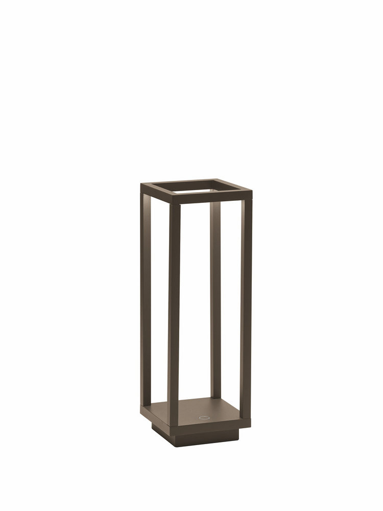 Die-cast aluminum table lamp with powder-coated finish in warm white light.