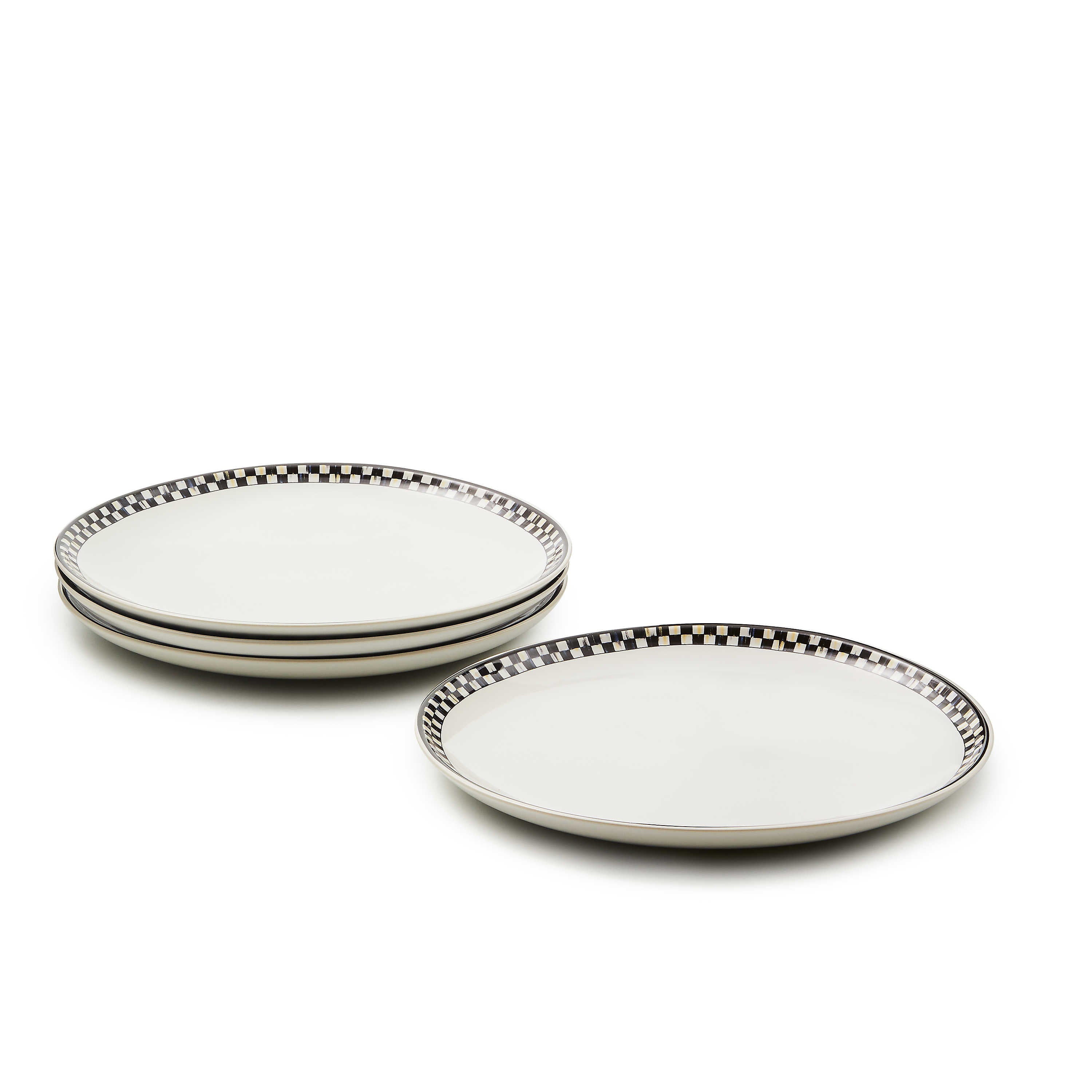 White stoneware dinner plate with a black and white checkered rim, shown in a stack and single.