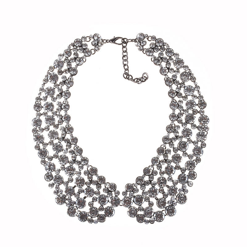 Exaggerated sparkling rhinestone collarbone chain necklace with glass crystals and lobster clasp.