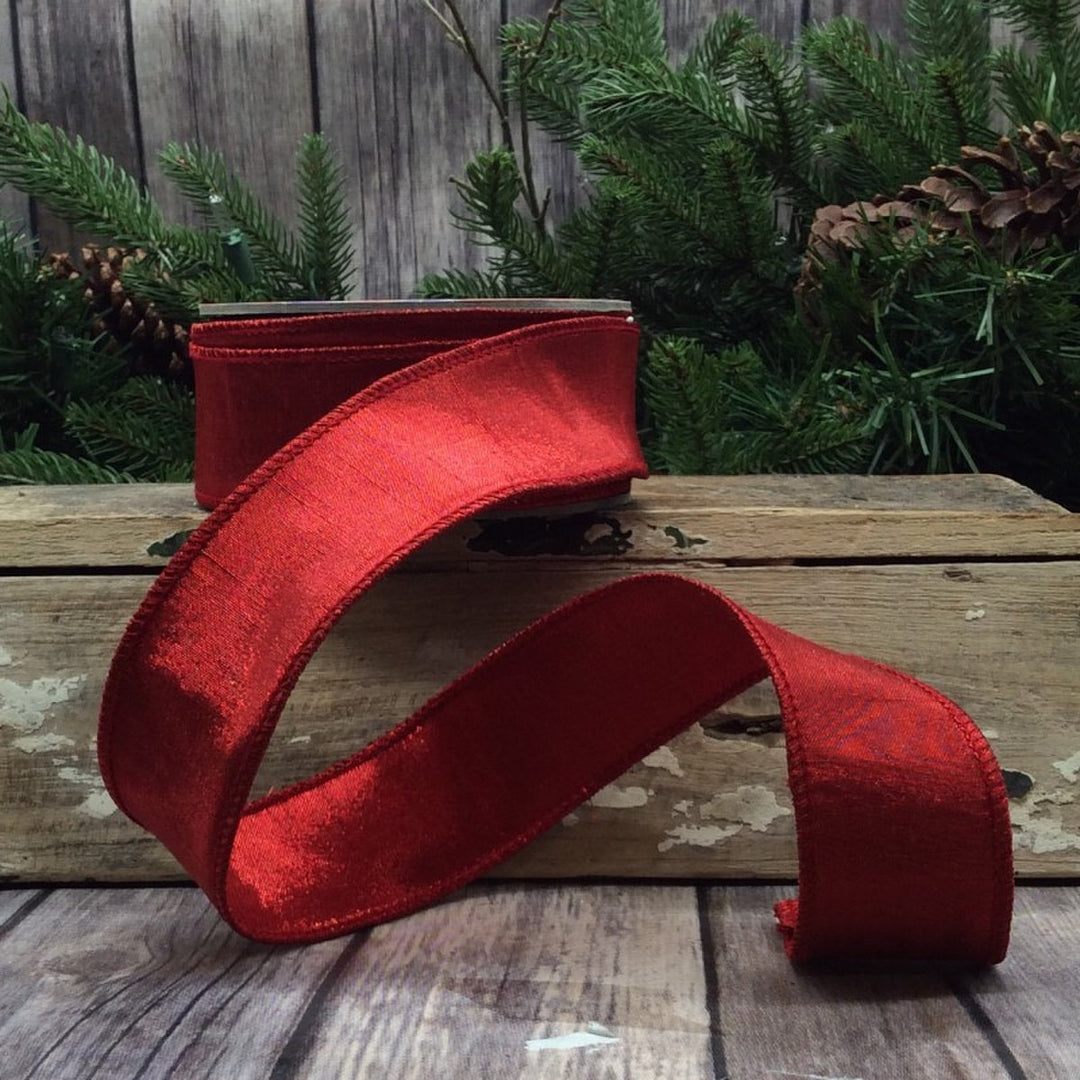 Red metallic dupion fabric roll measuring 1.5 inches wide by 10 yards long.