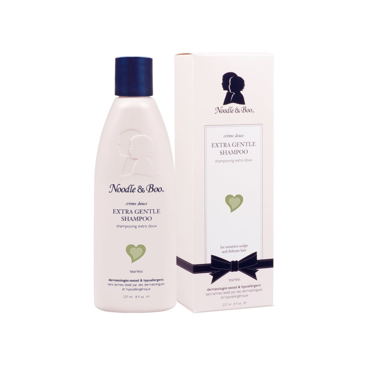 Bottle of Extra Gentle Shampoo with a white label featuring black text.