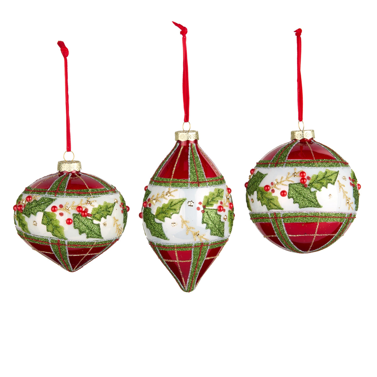 Three assorted glass Christmas ornaments in red, white, and green with plaid and holly patterns.