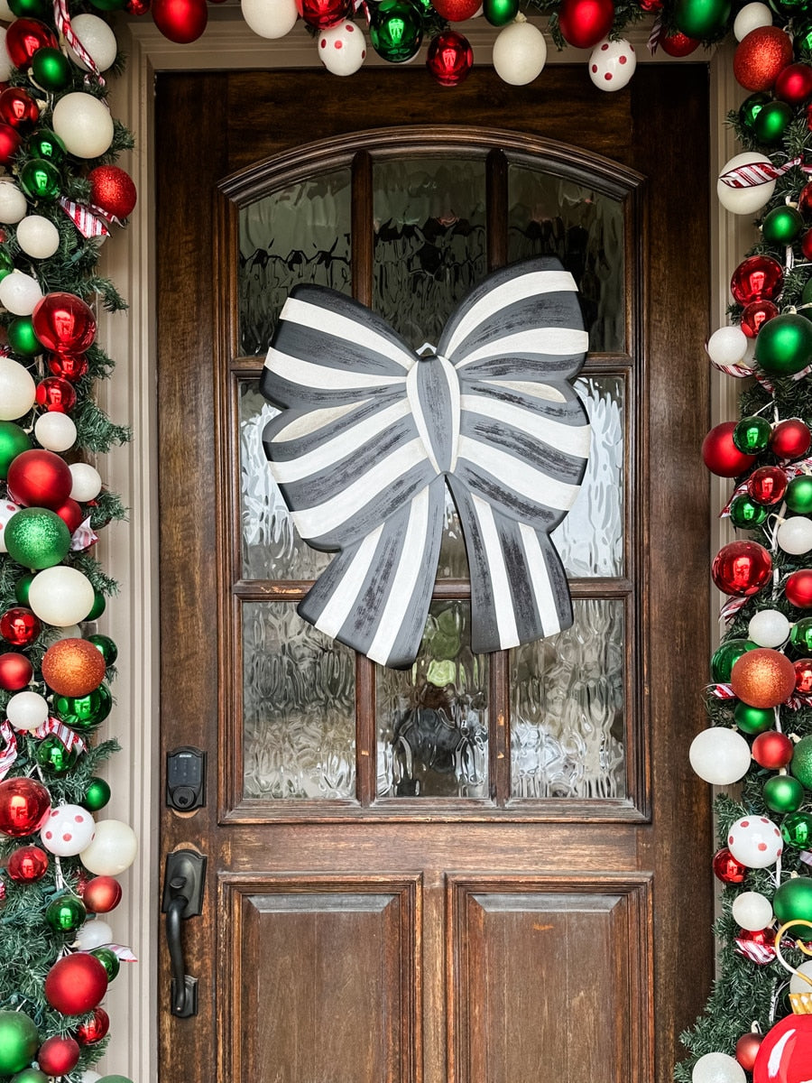 Elegant Bow Yard stake with a cream-colored fabric bow measuring 29 inches tall.