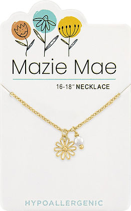 Gold Mazie Mae necklace with a daisy charm and a small white pearl dangle on a display card.