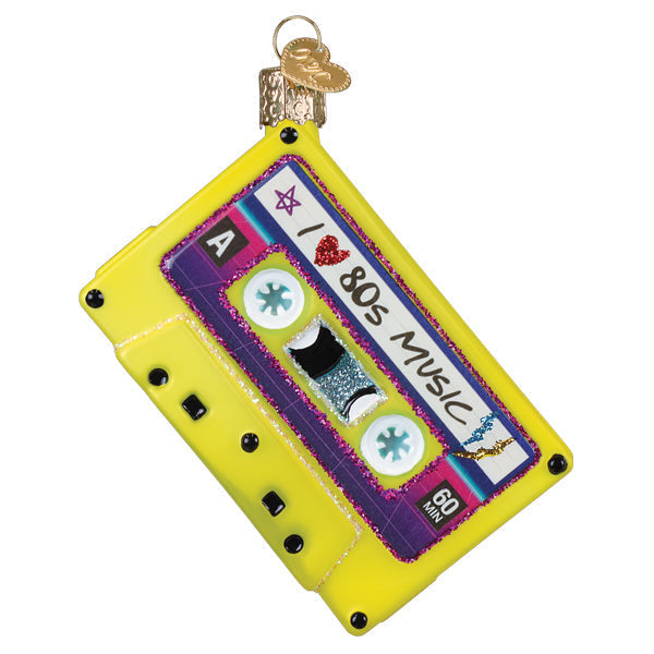 80s-themed Christmas ornament featuring a retro cassette tape with neon pink and blue colors.