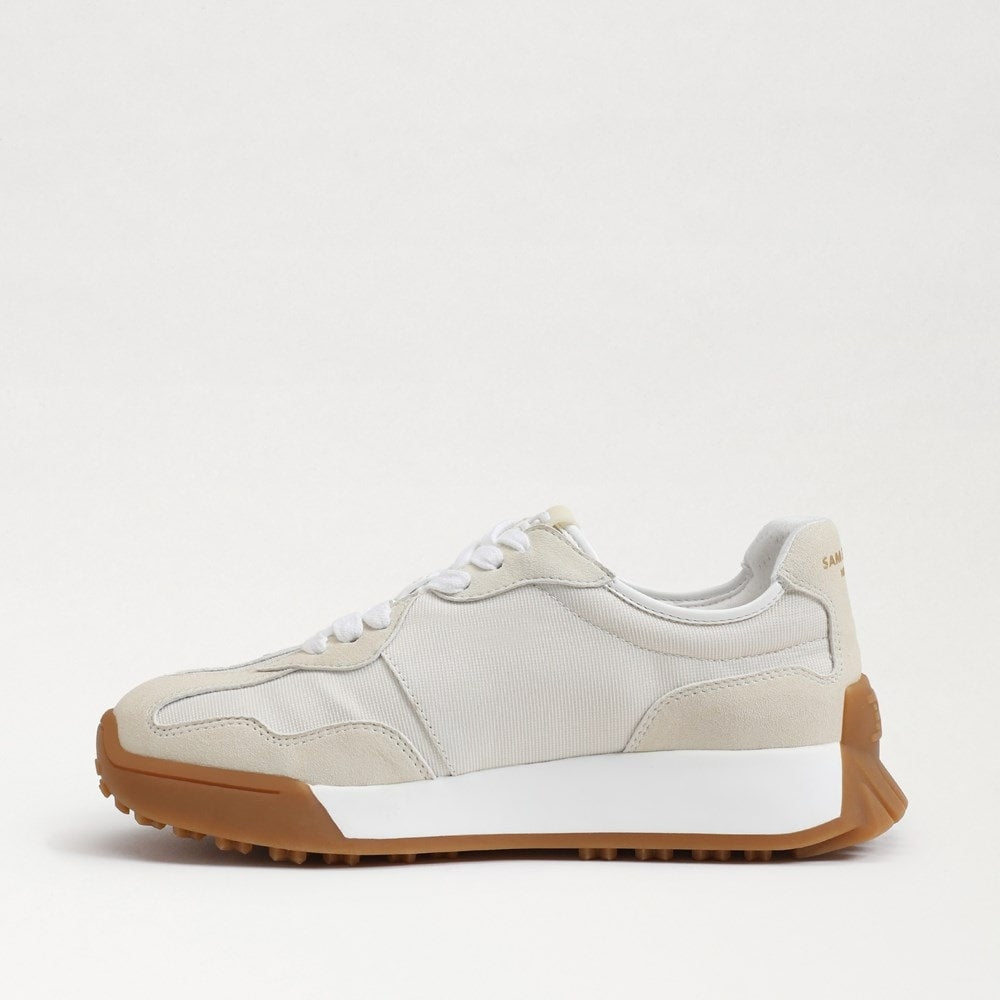 Langley lace-up sneaker in custom-dyed leather with fabric accents, rounded toe silhouette.