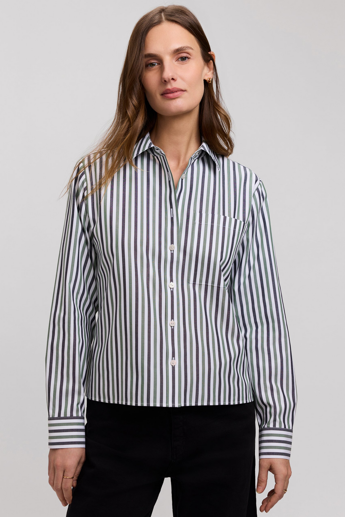 Woman wearing the Jodie No Iron Pinpoint Stripe Long Sleeve Short Shirt in a green and black stripe.
