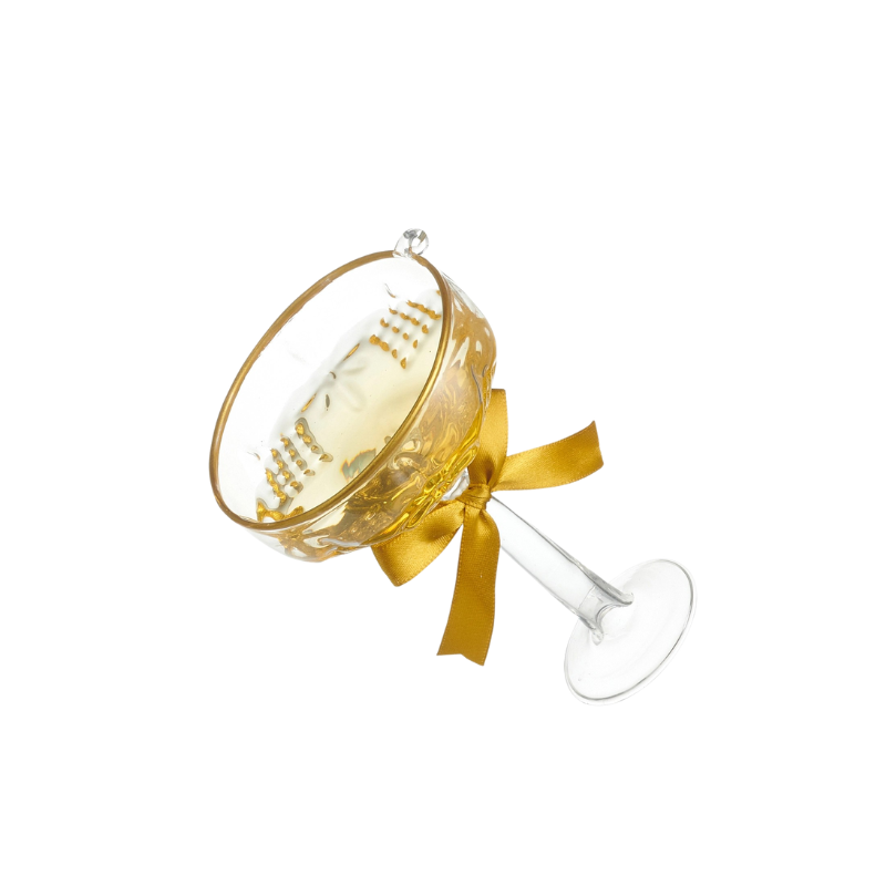5.5-inch glass champagne coupe ornament with gold rim, yellow liquid, and a gold satin bow.