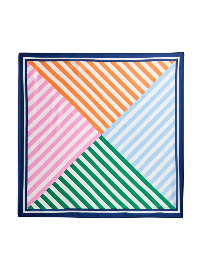 Multi-colored Geo Scarf with geometric patterns in a soft fabric.