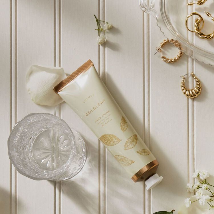 Goldleaf hand creme in a gold metallic bottle with black cap