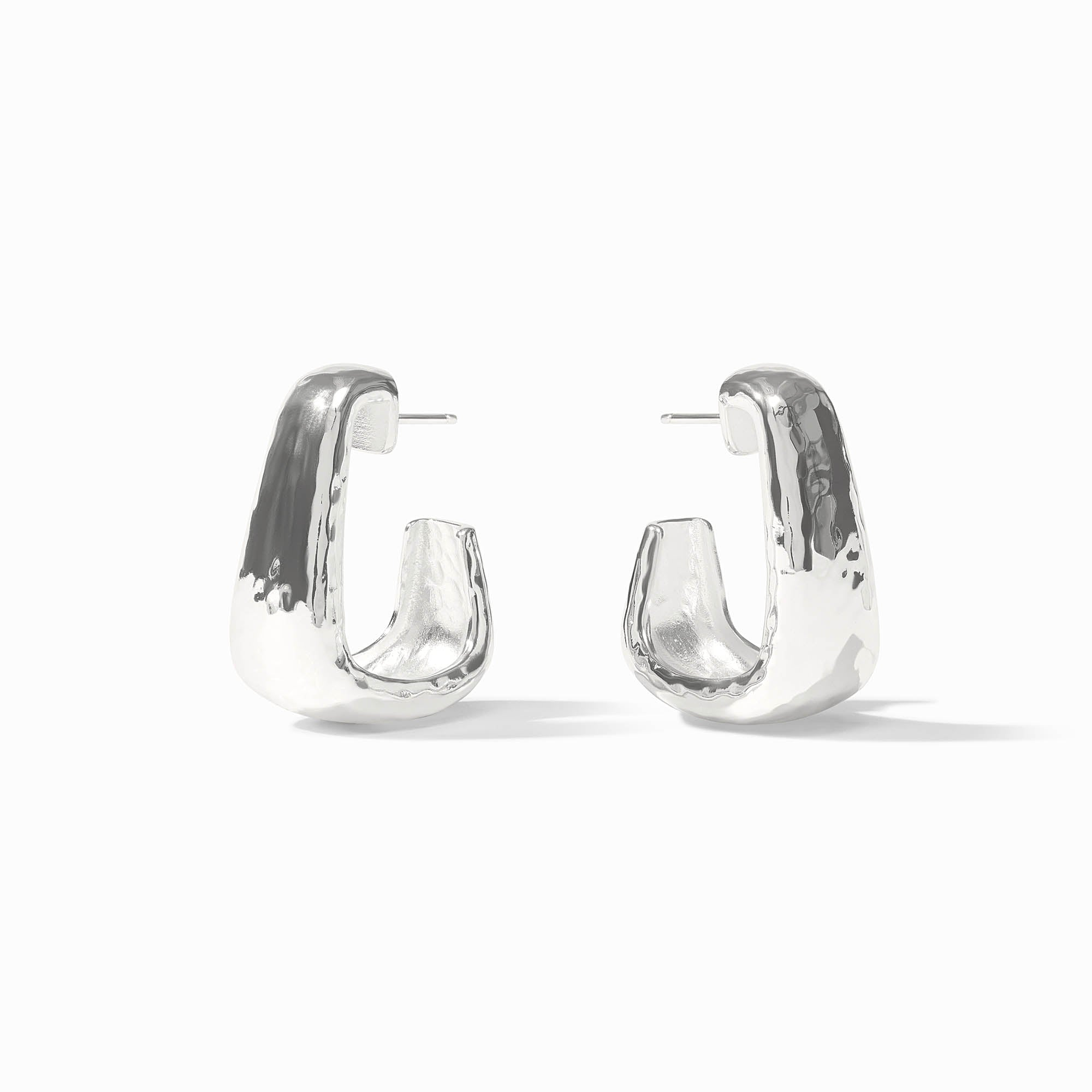 Pair of silver-plated Sahara hoop earrings with a hammered texture and post backs.