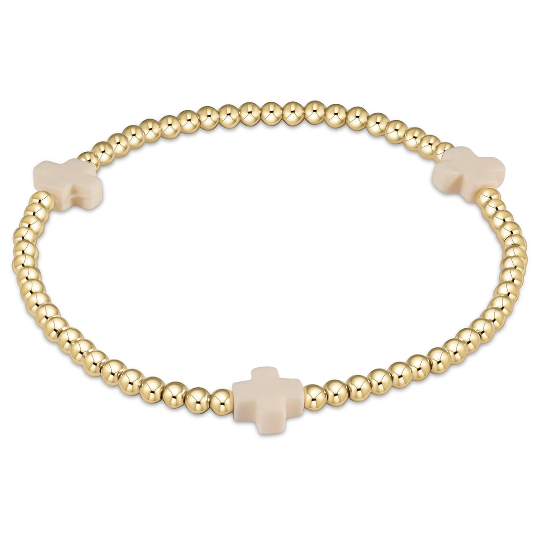 Enewton Signature Cross gold-filled bead bracelet with a cross pattern on high-performance elastic.