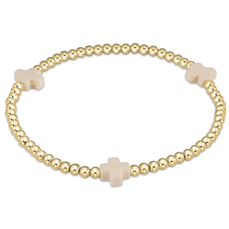 Enewton Signature Cross gold-filled bead bracelet with a cross pattern on high-performance elastic.