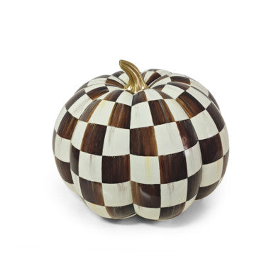 Jumbo pumpkin-shaped chocolate treat with a black checkered pattern.
