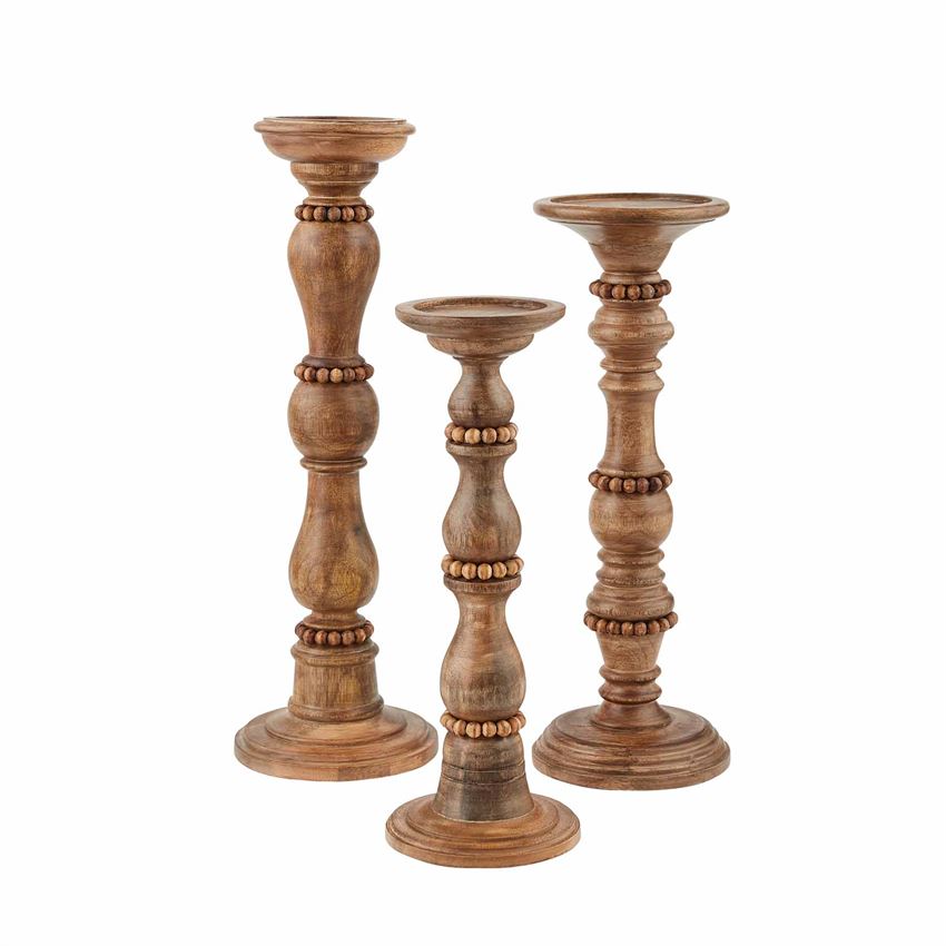 Small mango wood candle stick with beaded texture in natural brown tones