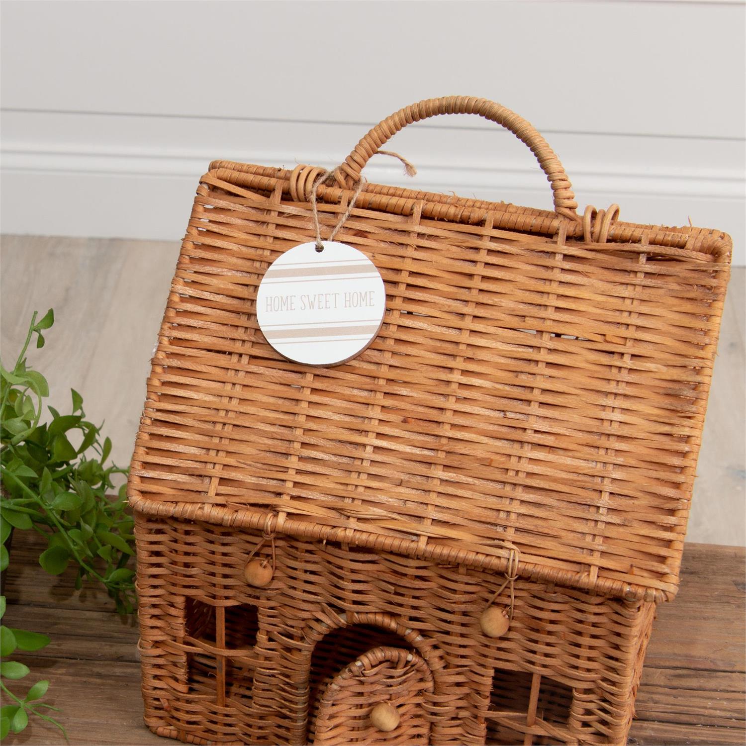 Woven chipwood basket with handle in natural wood tones