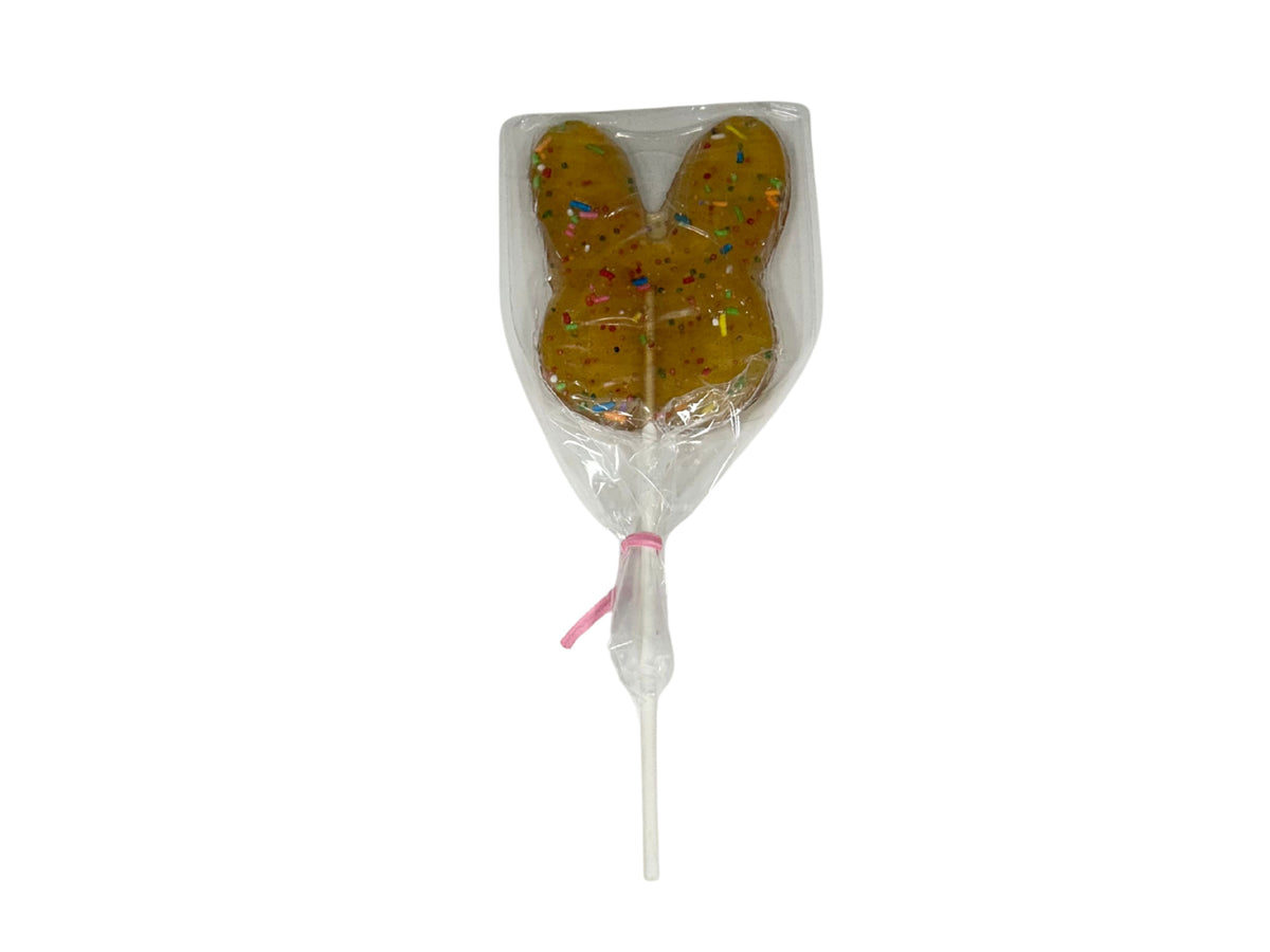 Funfetti Bunny Face lollipop with colorful sprinkles on a white stick.