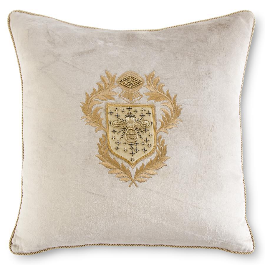 Square champagne velvet pillow with gold bee crest embroidery