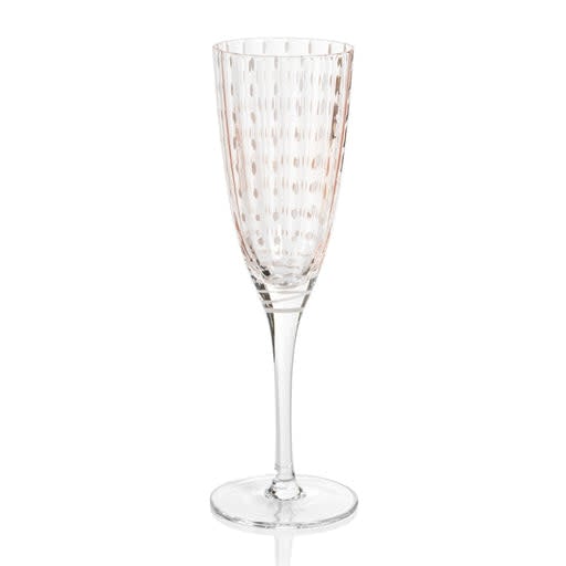 Portofino white dot champagne flute in pink with a slender stem and tapered bowl.