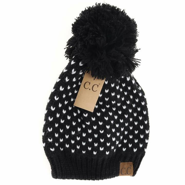 Heart Knit Pom Beanie in soft gray wool with a fluffy pom top.