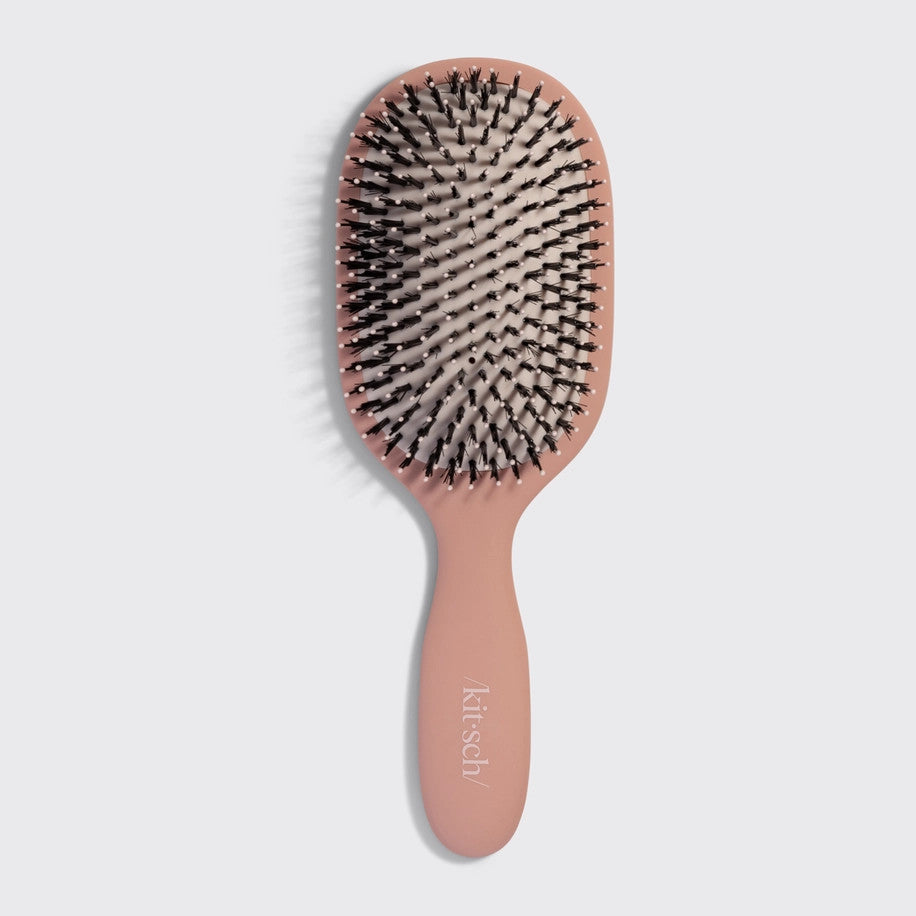 Terracotta smooth polish brush with dual bristles on a cushioned rubber pad