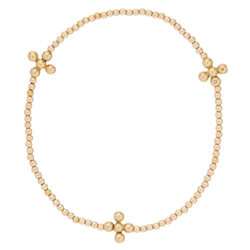 Signature Cross Gold Pattern 2MM Bead Bracelet with three gold-filled beaded crosses.