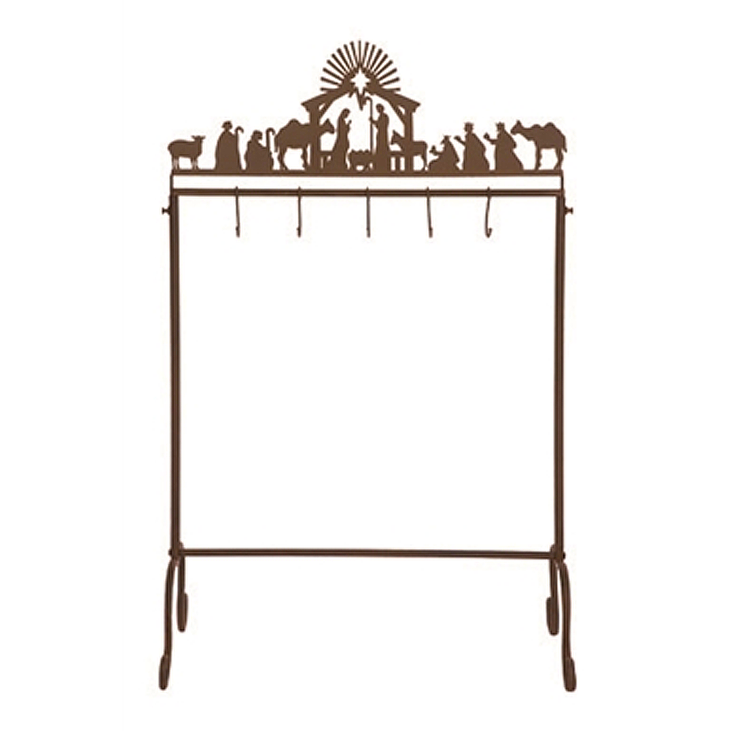 Metal nativity stocking holder featuring a creche scene with stable construction.