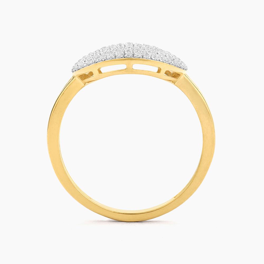 Silver-tone round statement ring with a central diamond accent on an adjustable band.