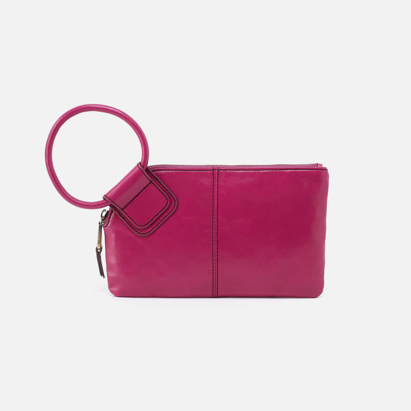 Sable leather wristlet with cactus flower embossed detail in a soft neutral tone.