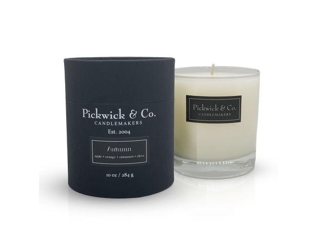Pickwick Candle in a clear glass jar with a white label.