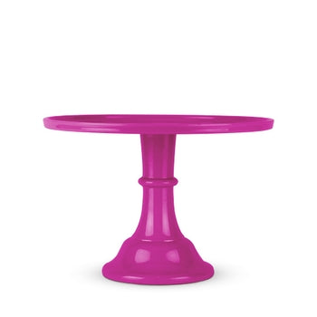 Bright pink melamine cake stand with a flat top and a pedestal base.