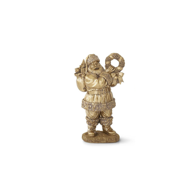 Antique gold resin Santa figurine holding a wreath and a sack of toys on a textured base.