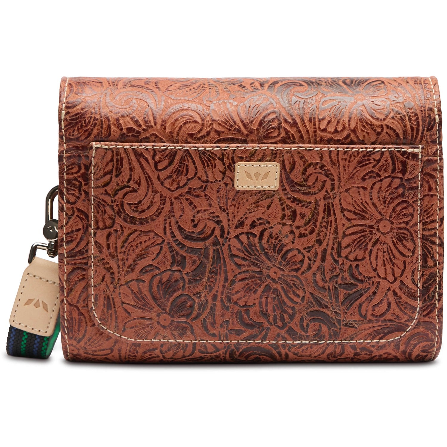 On the Town Sally tooled leather crossbody bag in brown with floral patterns and magnetic closure.
