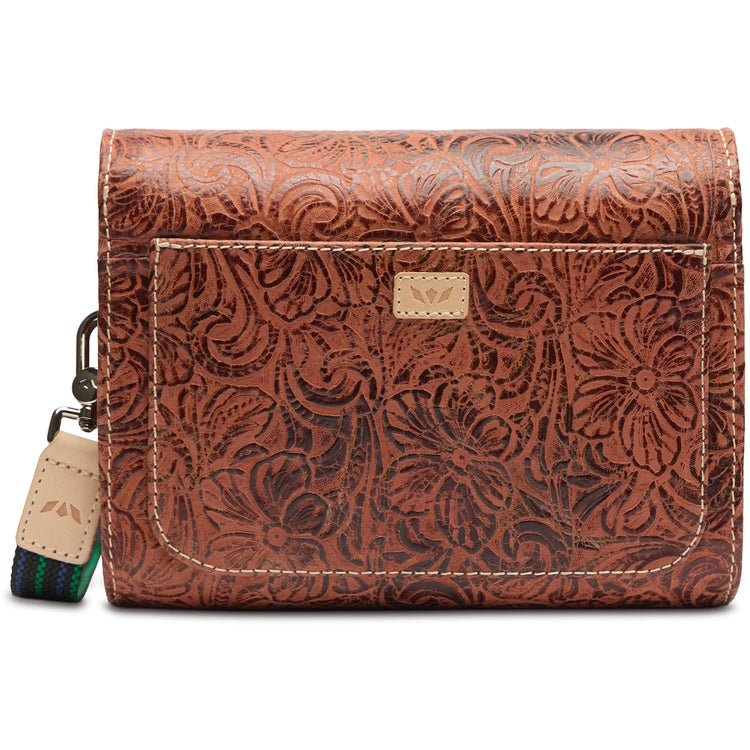 On the Town Sally tooled leather crossbody bag in brown with floral patterns and magnetic closure.
