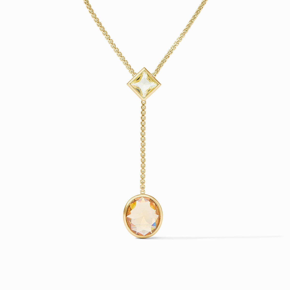 Adjustable lariat necklace with a long pendant chain in gold plate featuring an imported glass stone.