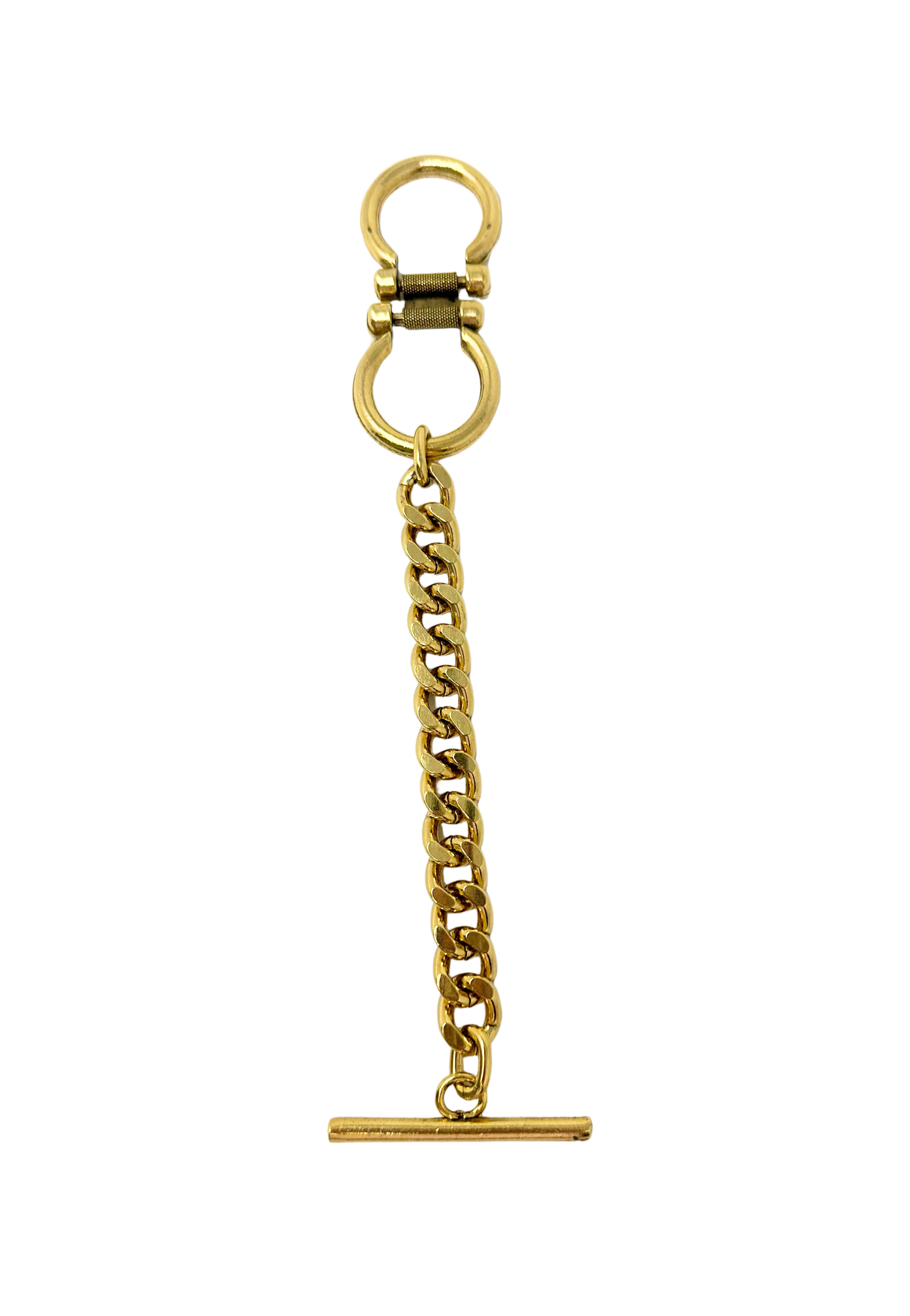 Gold curb link bracelet featuring a double-ring connector and a toggle bar clasp.