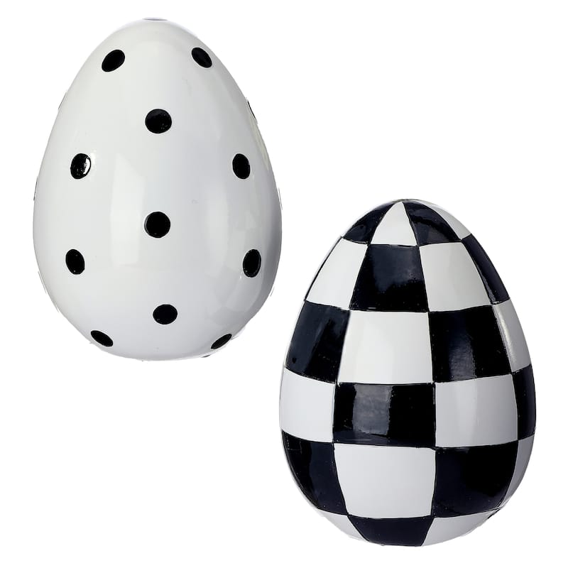 Hand-painted resin Easter egg with festive colors on a white background