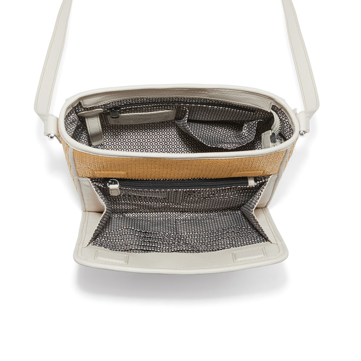 Natural-white faux straw Astrid organizer bag with adjustable strap, zip top closure, and exterior pockets.